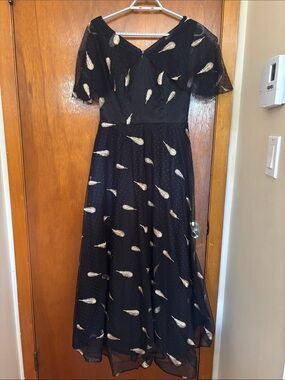 Black and gold midi dress